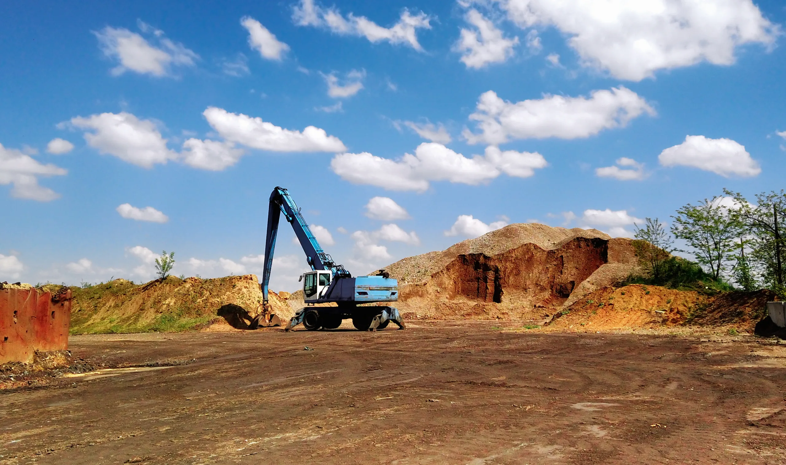 Industrial Excavator Working On Construction Site