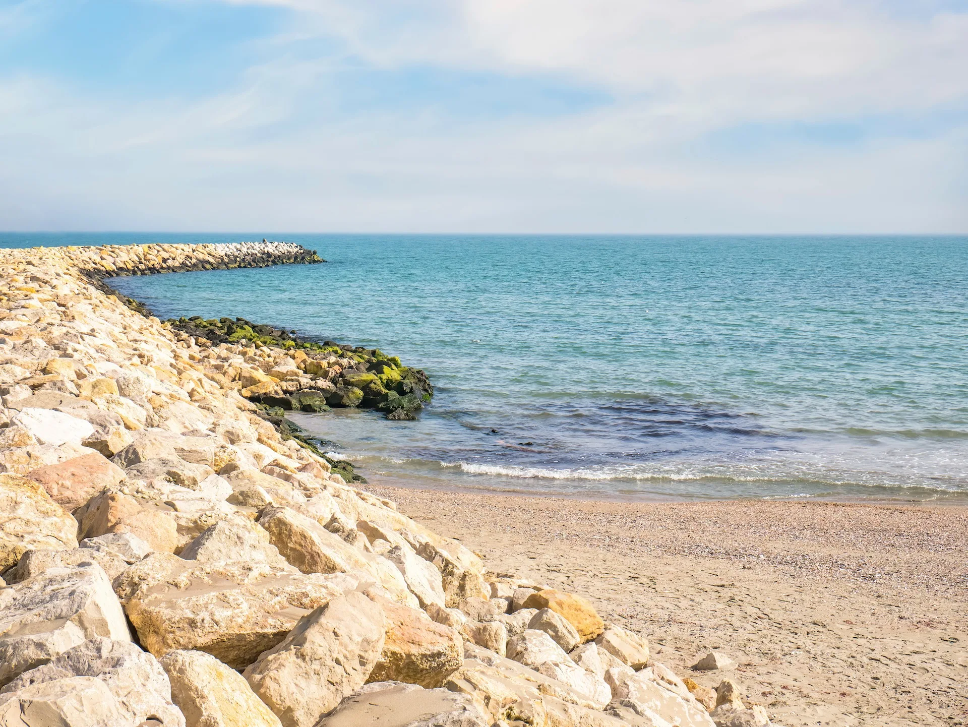 Riprap Or Rock Armour Structure For Protecting The Sea Coastline. Black Sea Waterfront In Constanta, Romania.